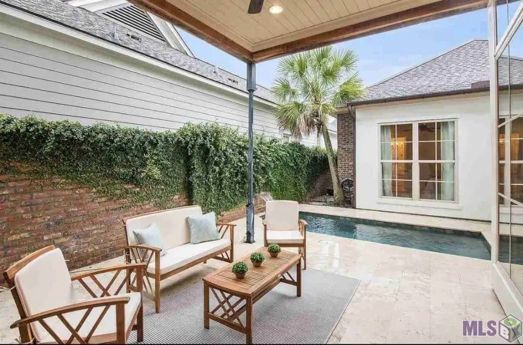 Swift Painting LLC professionals expertly applying interior wall paint, Baton Rouge