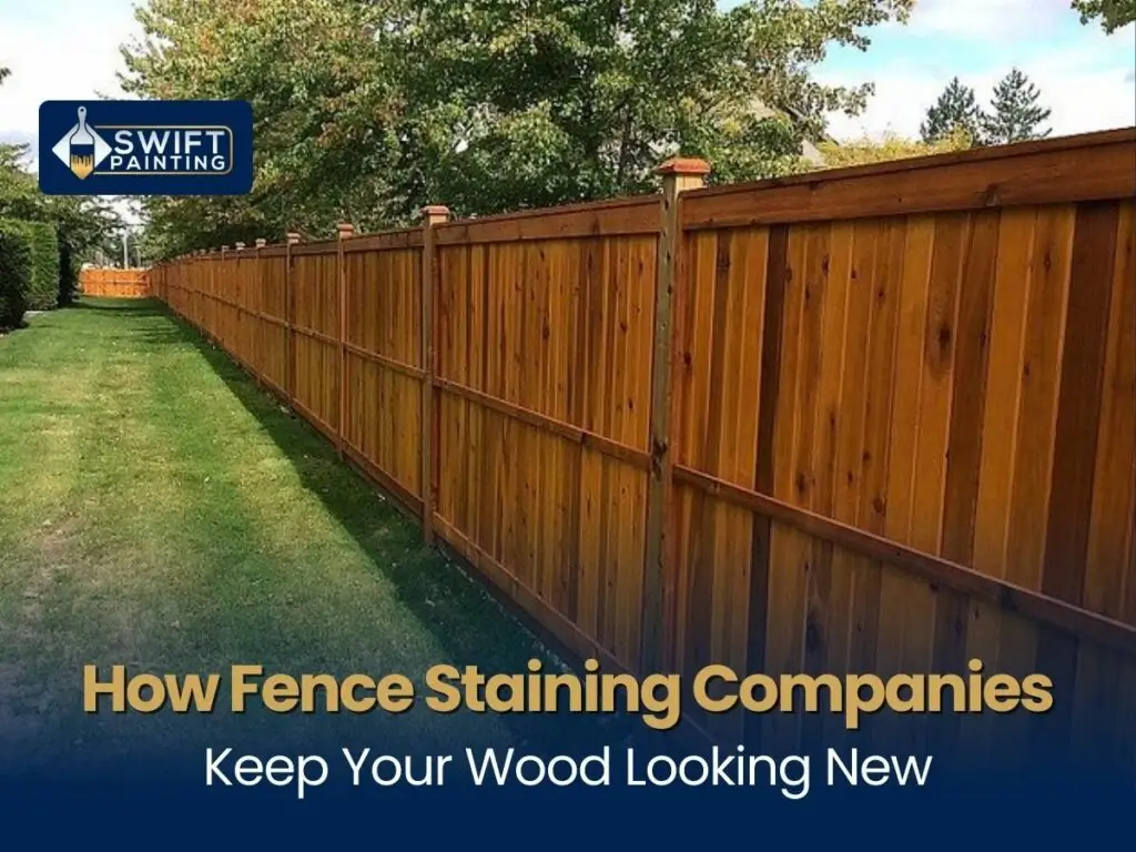 Long wooden fence with a fresh brown stain finish by Swift Painting.